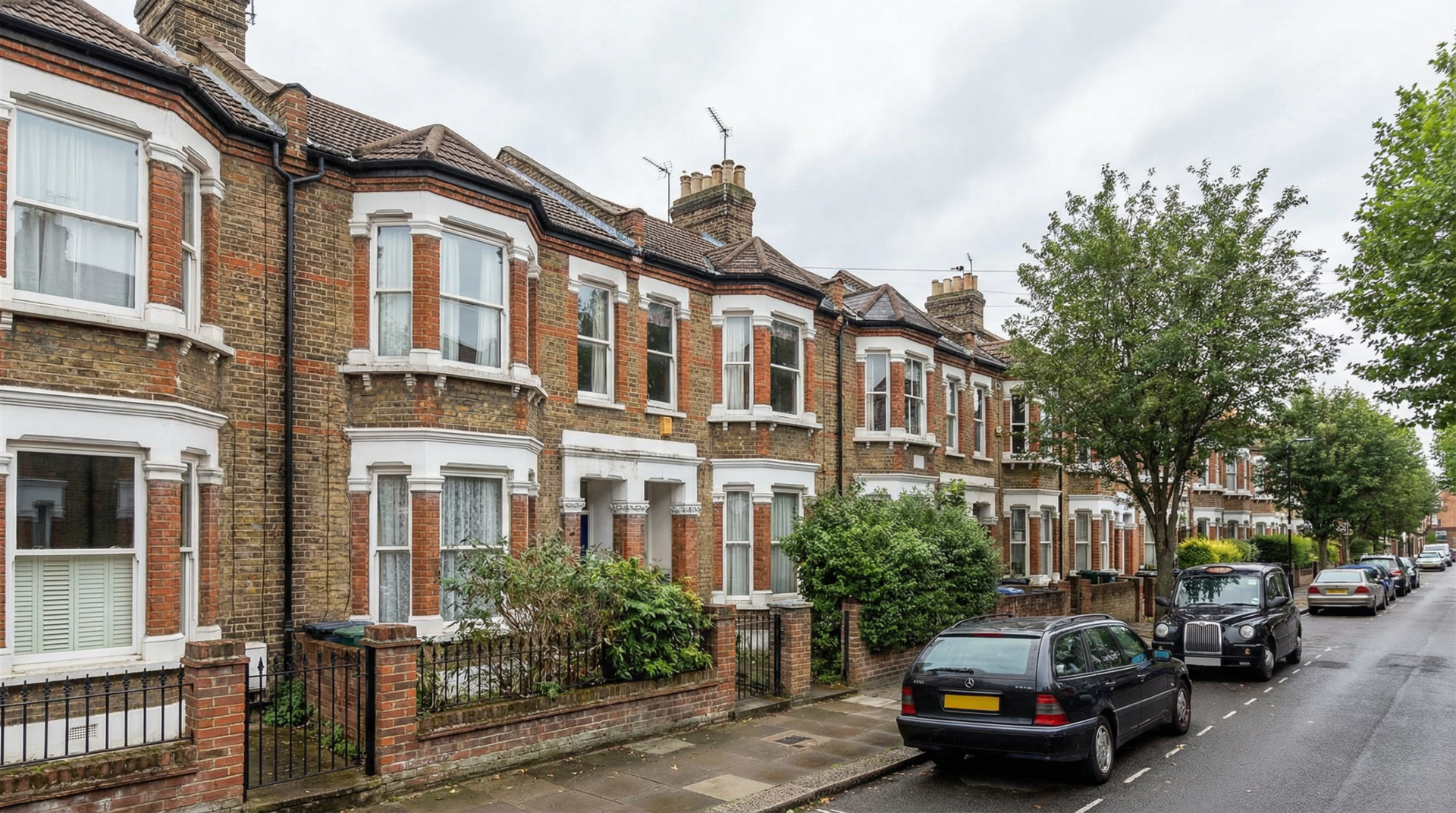 Row of Victorian terraced houses on a residential street in East London, typical of rent-to-rent properties